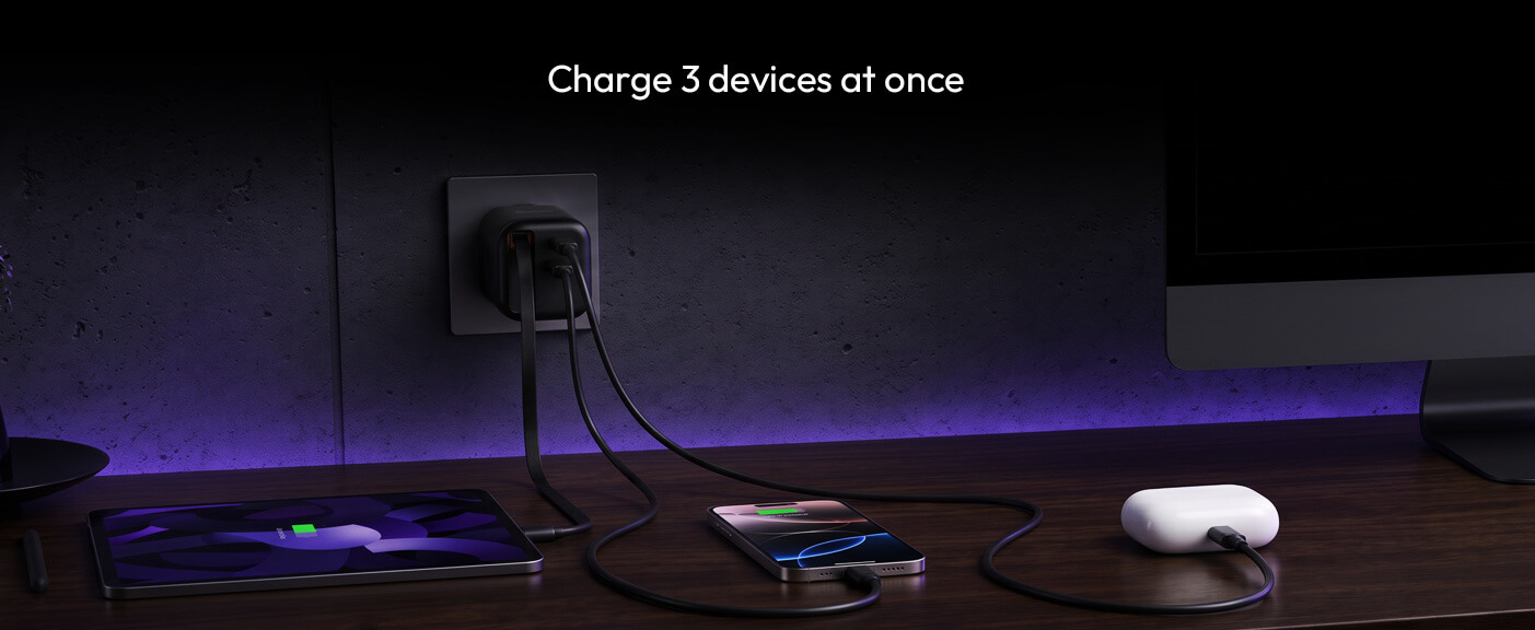 Azenzi Plugd charging a tablet, phone and earbuds at the same time